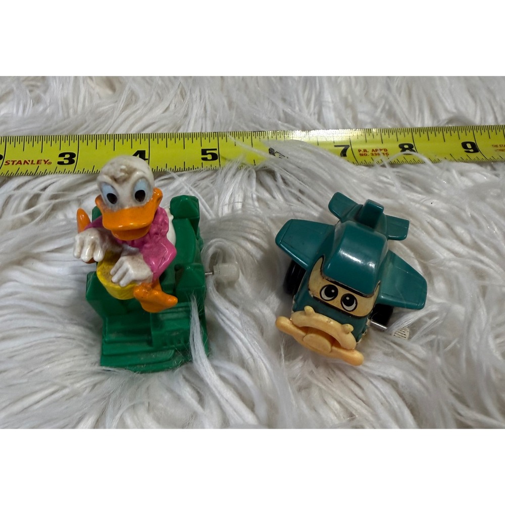 Vintage Disney Daisy Duck Burger King & 1978 Tomy Airplane Wind Up Toy Lot